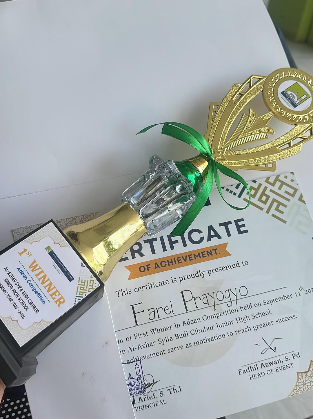 Piala dan sertifikat pemenang lomba Adzan Farel Prayoga